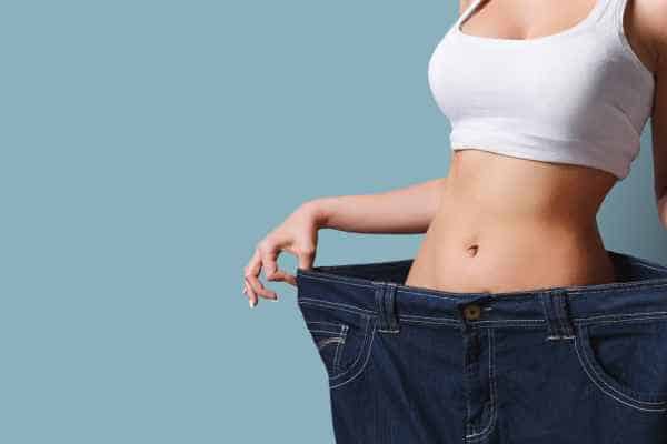 woman after fat reduction treatment Swansea
