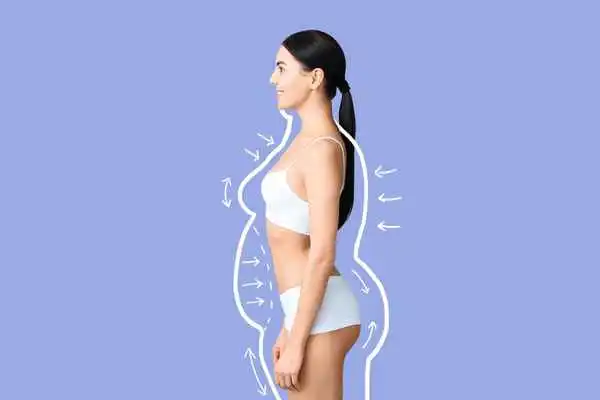 image of woman experiencing fat reduction treatment Swansea