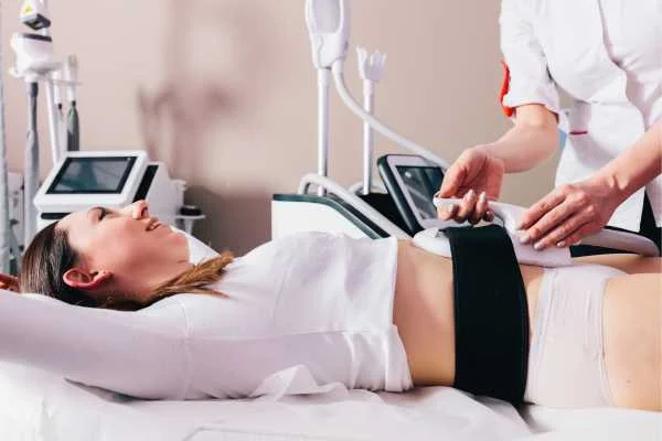 woman having body sculpting to help improve her body image and her mental health Swansea